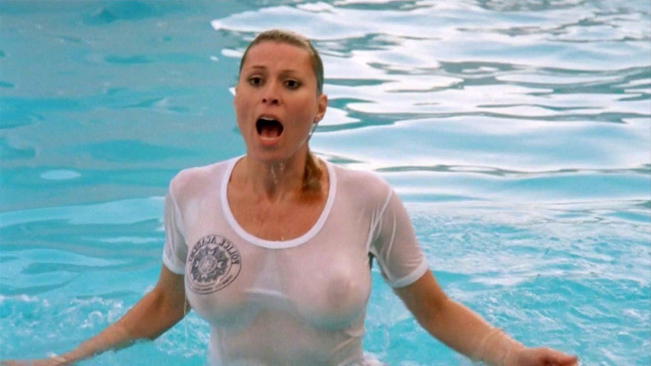 16P Leslie Easterbrook exposing her nice big boobs in wet see thru shirt