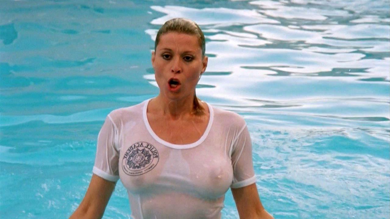 16P Leslie Easterbrook exposing her nice big boobs in wet see thru shirt