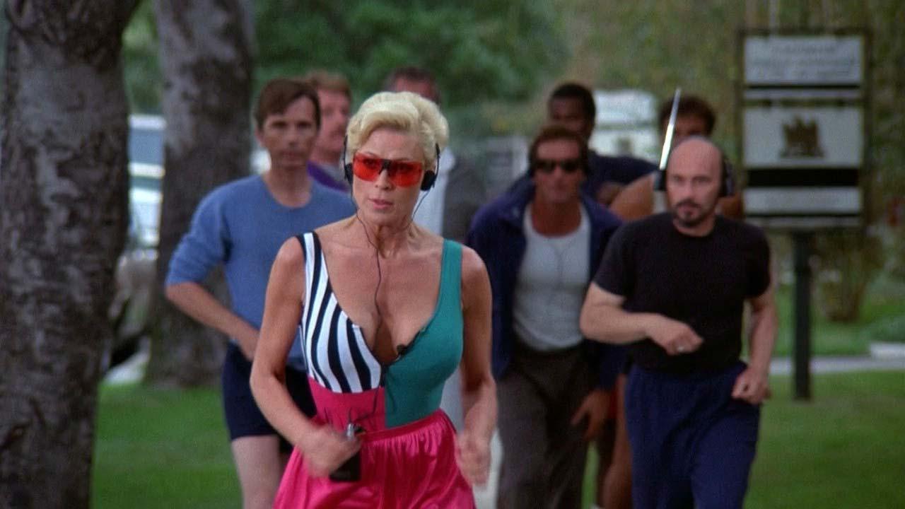 16P Leslie Easterbrook exposing her nice big boobs in wet see thru shirt