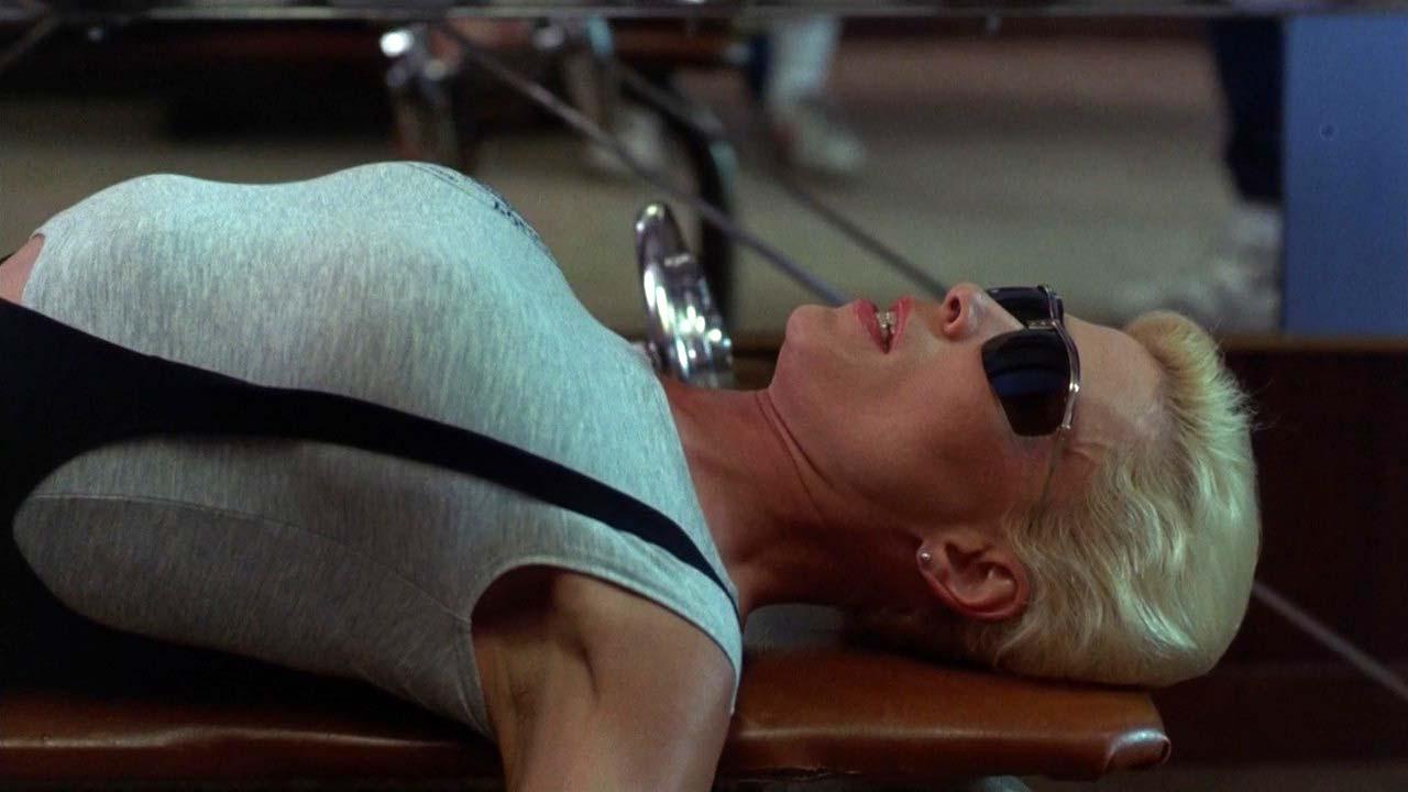 16P Leslie Easterbrook exposing her nice big boobs in wet see thru shirt