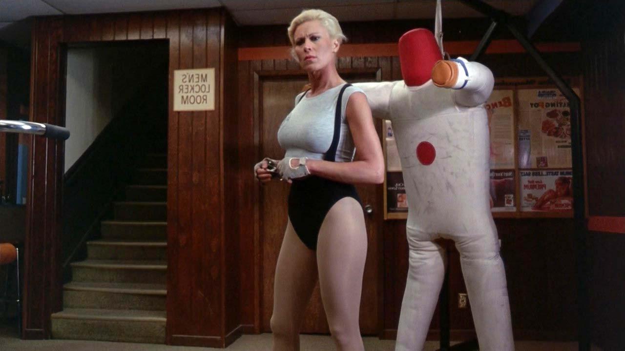 16P Leslie Easterbrook exposing her nice big boobs in wet see thru shirt