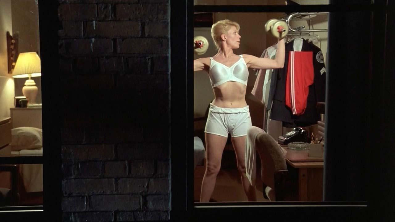 16P Leslie Easterbrook exposing her nice big boobs in wet see thru shirt