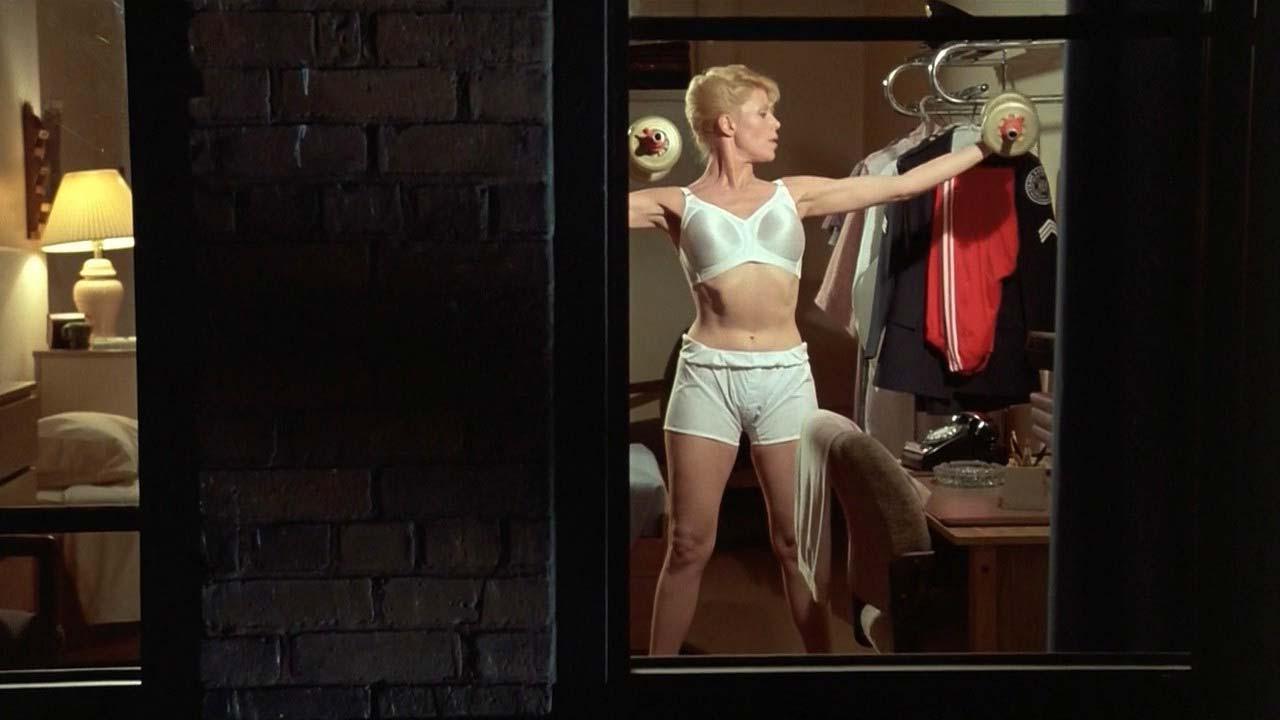 16P Leslie Easterbrook exposing her nice big boobs in wet see thru shirt