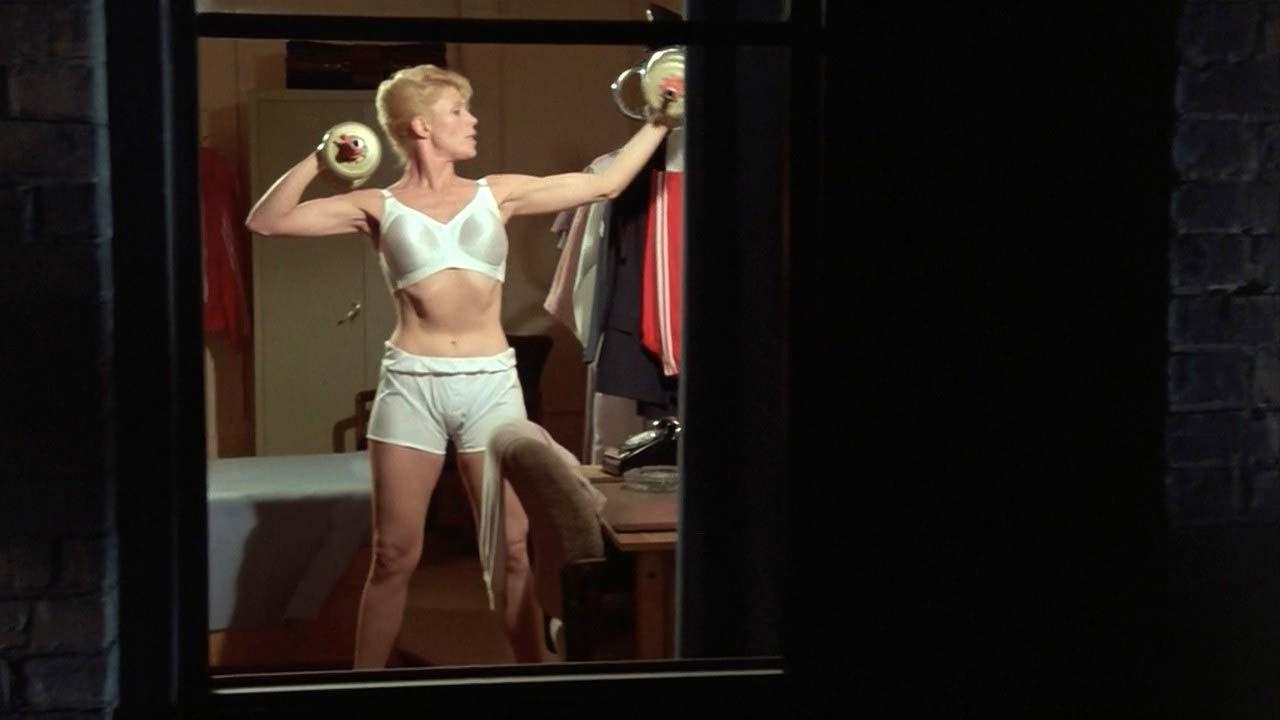 16P Leslie Easterbrook exposing her nice big boobs in wet see thru shirt