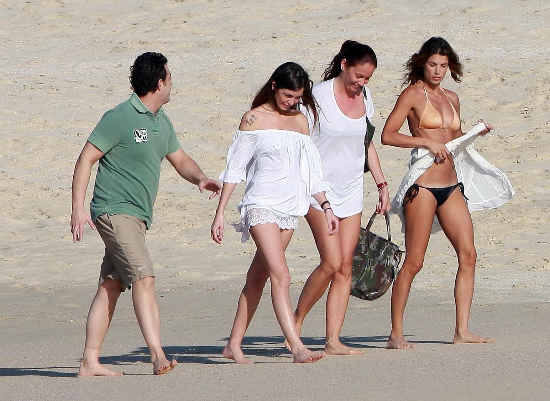 16P Elisabetta Canalis showing pokies in tan colored bikini top at the beach in Los 