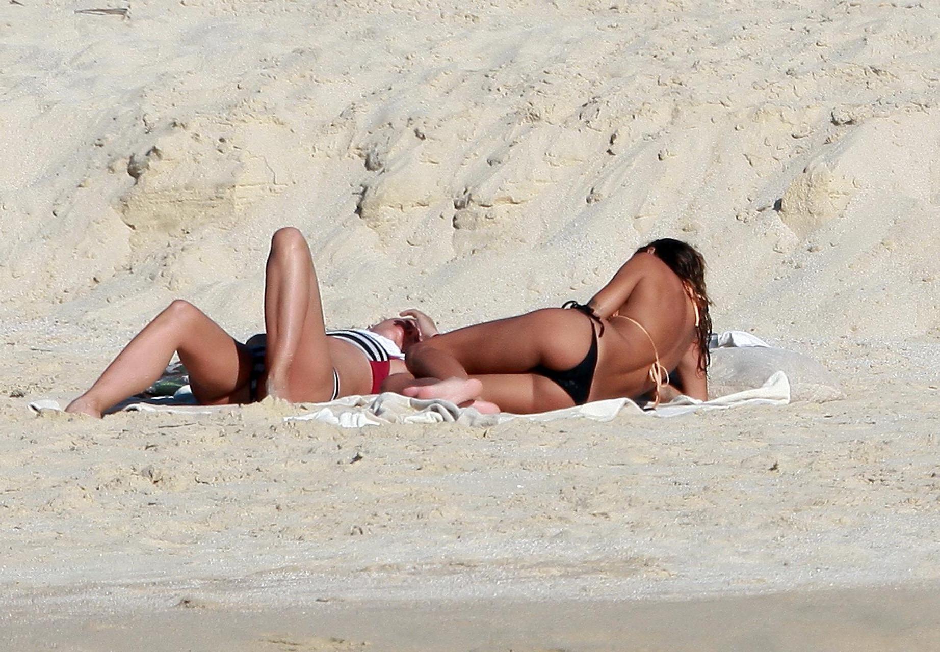 16P Elisabetta Canalis showing pokies in tan colored bikini top at the beach in Los 