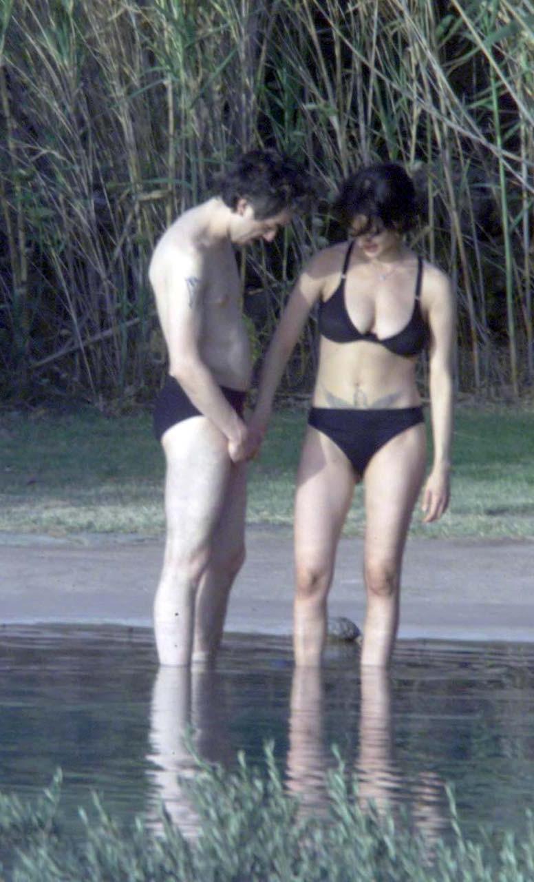 10P Asia Argento exposing her nice big boobs paparazzi shoots and showing pussy