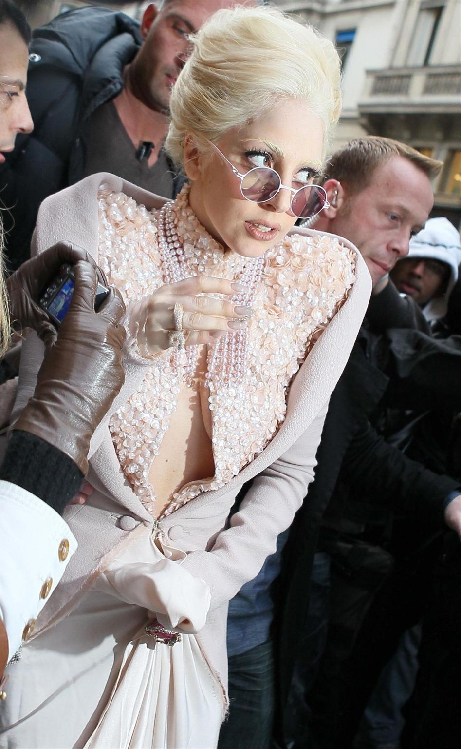 16P Lady Gaga showing off her boobs  ass on the streets of Paris