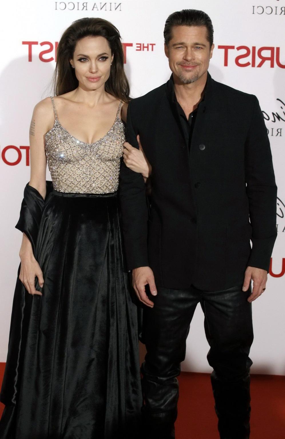 16P Angelina Jolie busty  braless at 'The Tourist' premiere in Madrid