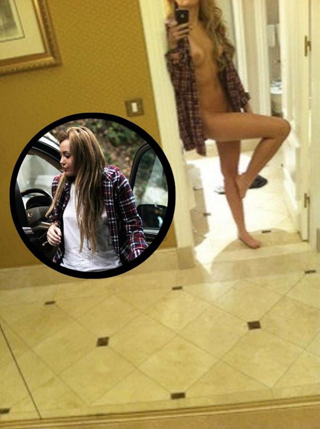 10P Miley Cyrus exposing her tits and try to cover pussy in private stolen nude pict