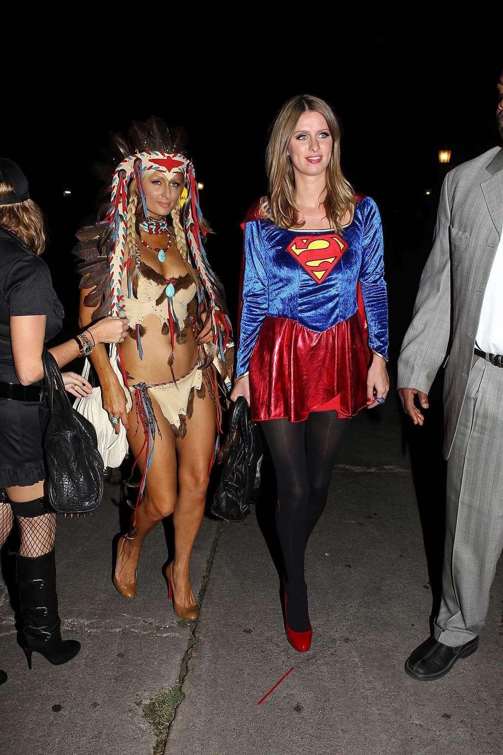 10P Paris Hilton looking very sexy in Helloween costume and showing her big cleavage