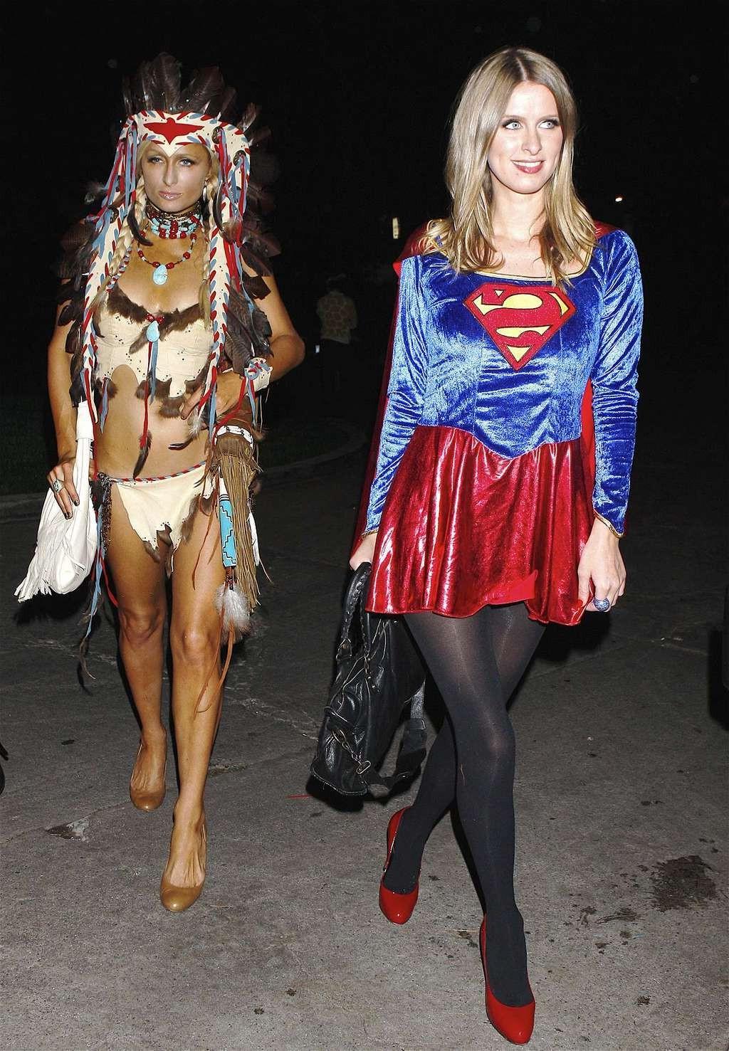 10P Paris Hilton looking very sexy in Helloween costume and showing her big cleavage