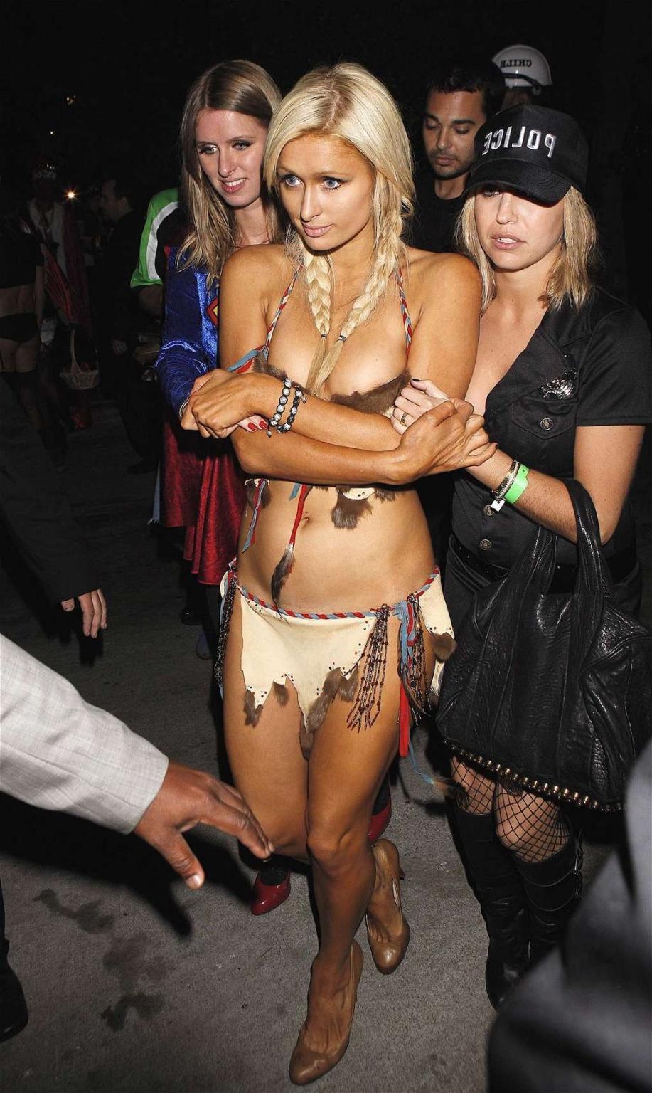 10P Paris Hilton looking very sexy in Helloween costume and showing her big cleavage