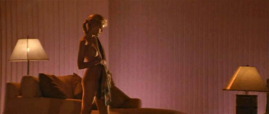 10P Sharon Stone exposing her perky boobs and fucking hard with guy in nude movie sc