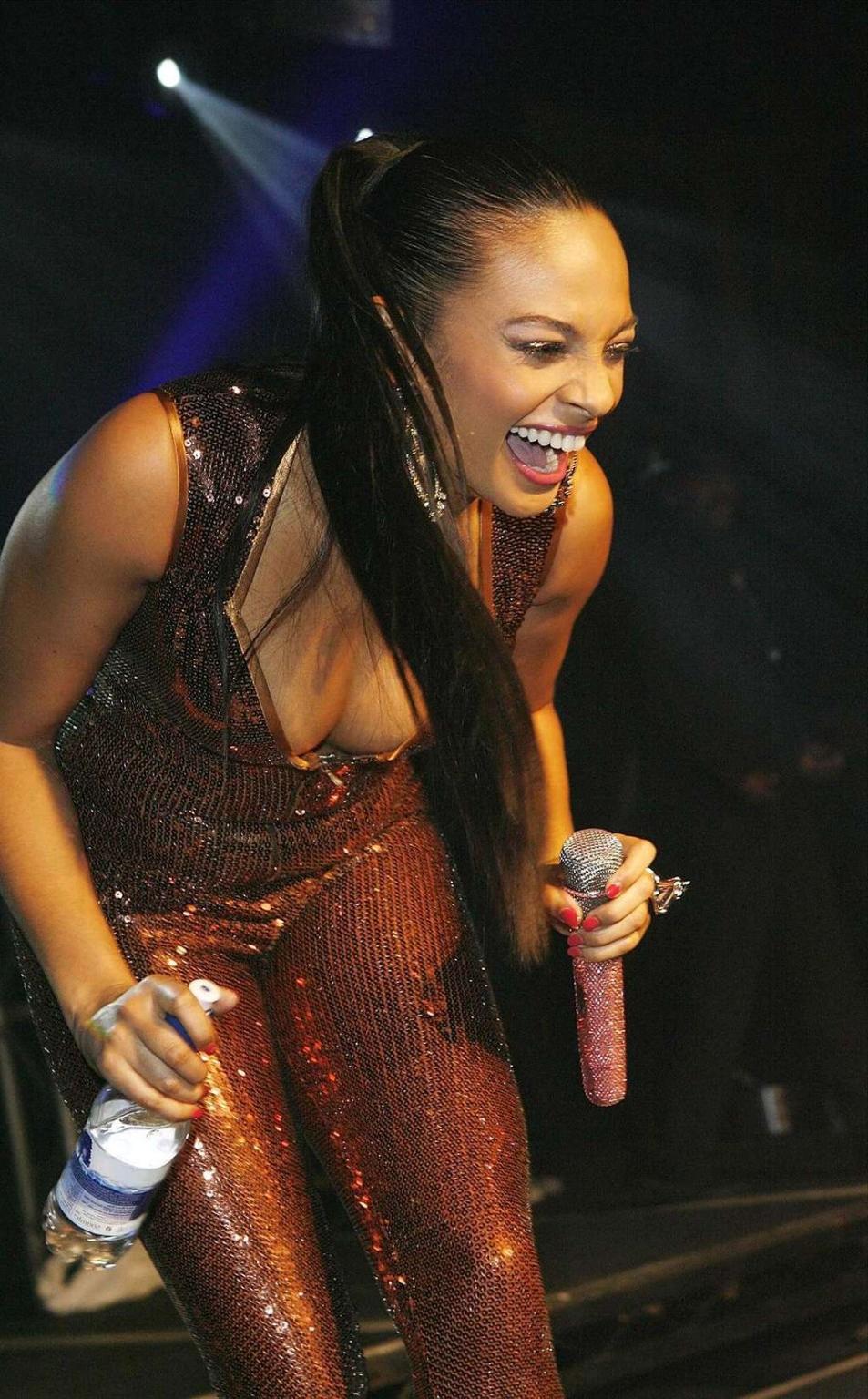 10P Alesha Dixon in latex outfit performing on stage and leggy in mini skirt