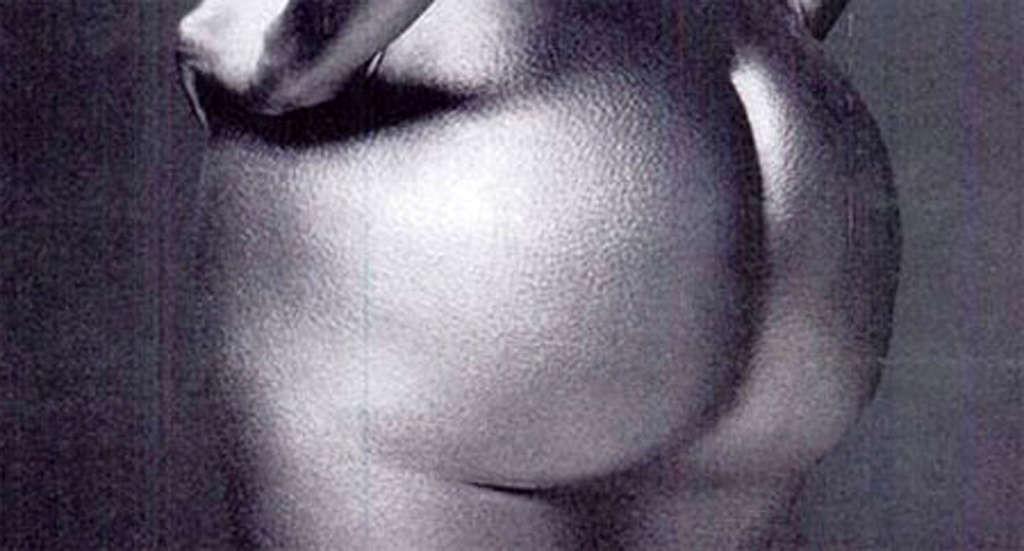 16P Kim Kardashian posing nude and showing huge boobs and sexy ass