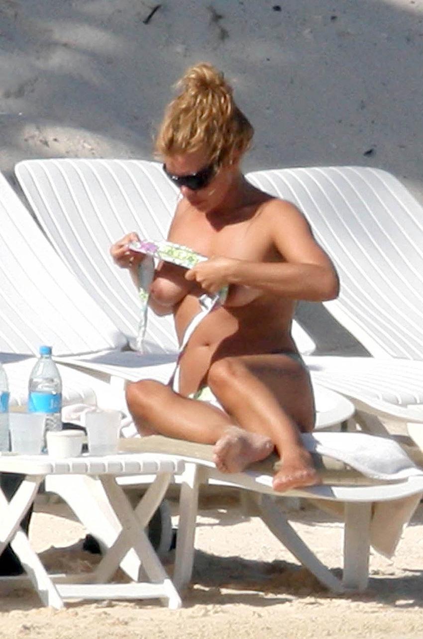 15P Billie Piper sunbathing topless on the beach