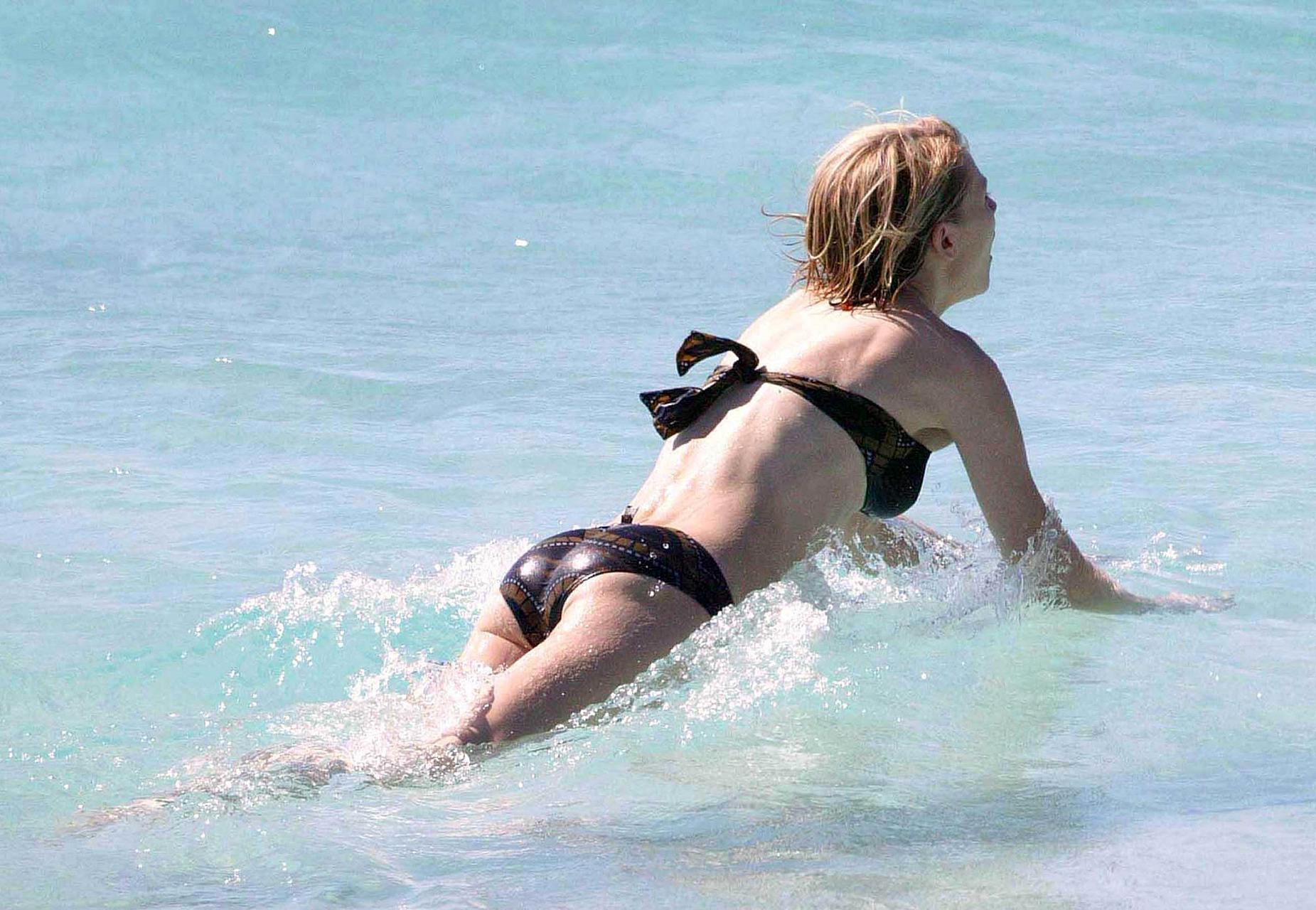 16P Kirsten Dunst exposing her sexy body and hot ass in bikini on beach