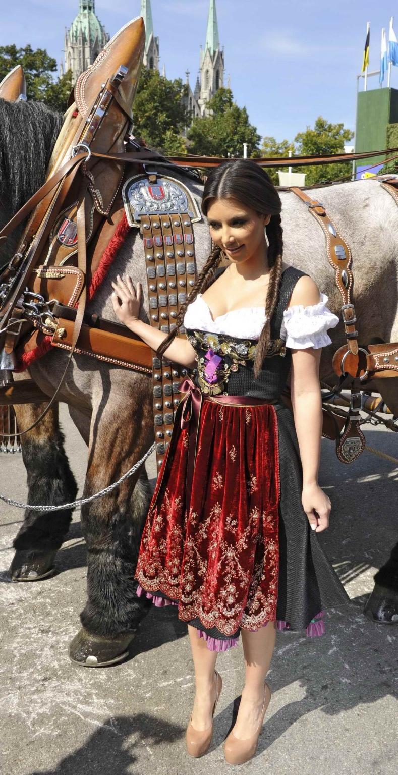15P Kim Kardashian busty in German folkware at the Oktoberfest in Munich