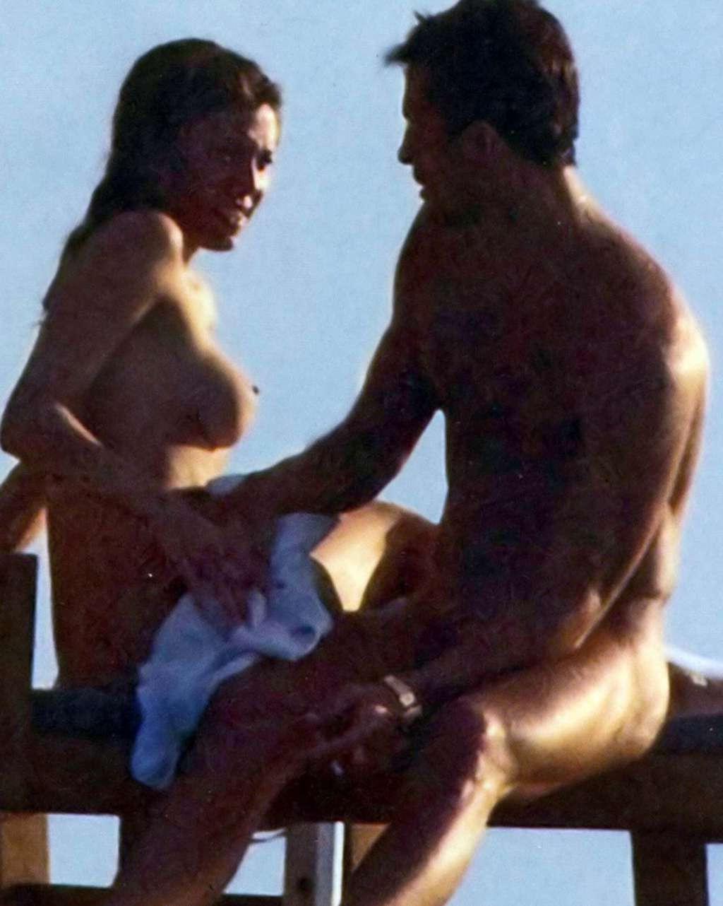 10P Belen Rodriguez exposing her nice tits on beach paparazzi pictures and ass in th