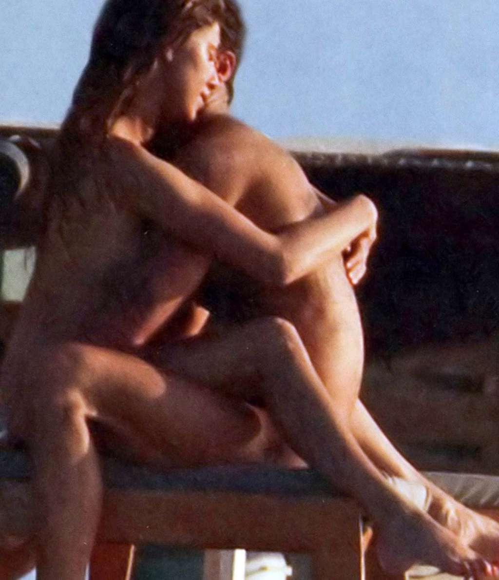 10P Belen Rodriguez exposing her nice tits on beach paparazzi pictures and ass in th