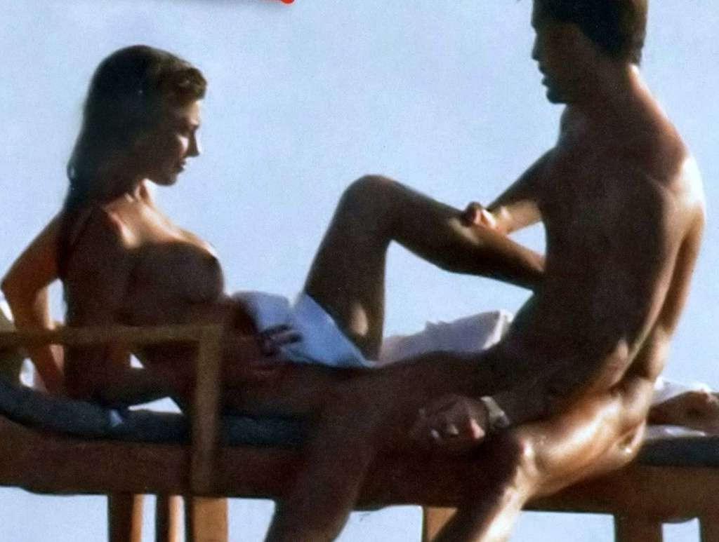 10P Belen Rodriguez exposing her nice tits on beach paparazzi pictures and ass in th
