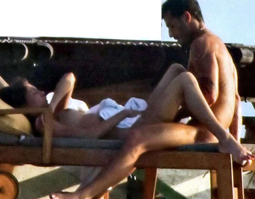 10P Belen Rodriguez exposing her nice tits on beach paparazzi pictures and ass in th
