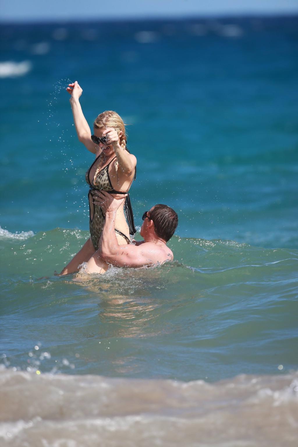 15P Paris Hilton wearing sexy leopard print swimsuit in Hawaii