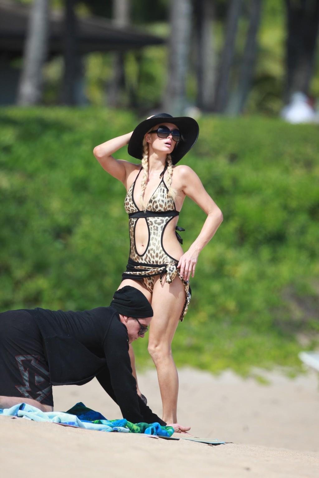 15P Paris Hilton wearing sexy leopard print swimsuit in Hawaii