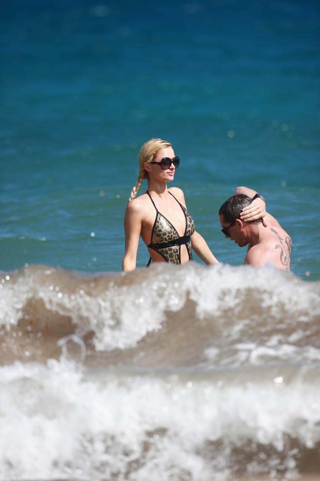 15P Paris Hilton wearing sexy leopard print swimsuit in Hawaii