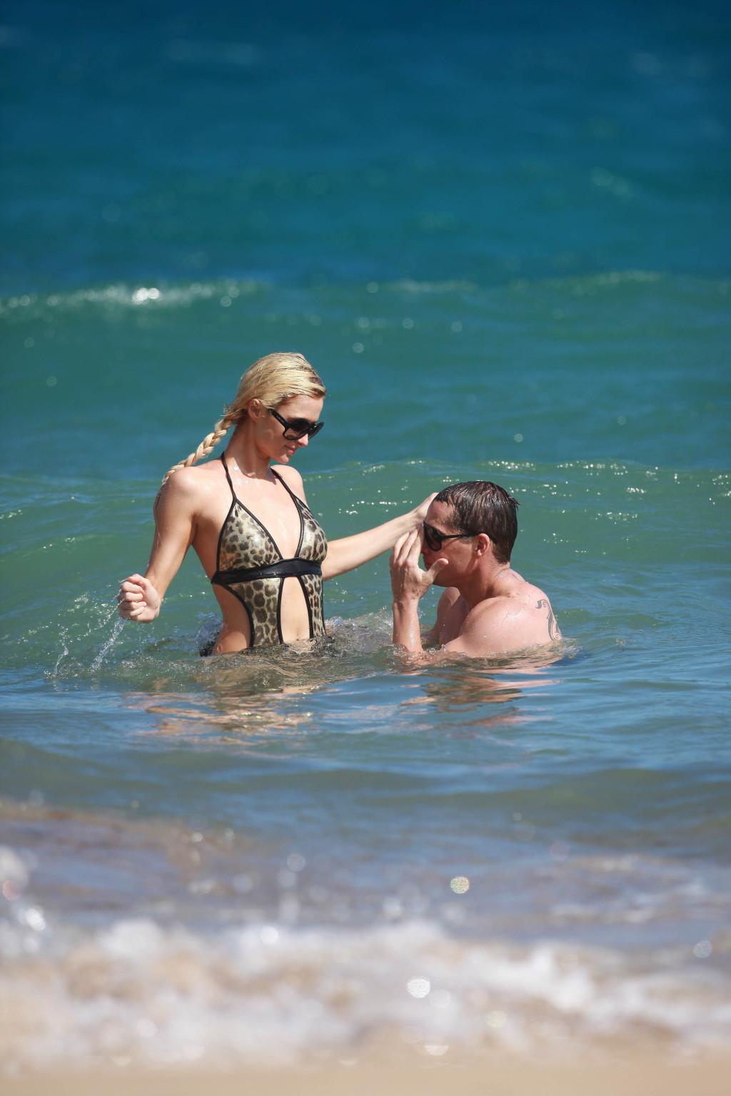 15P Paris Hilton wearing sexy leopard print swimsuit in Hawaii