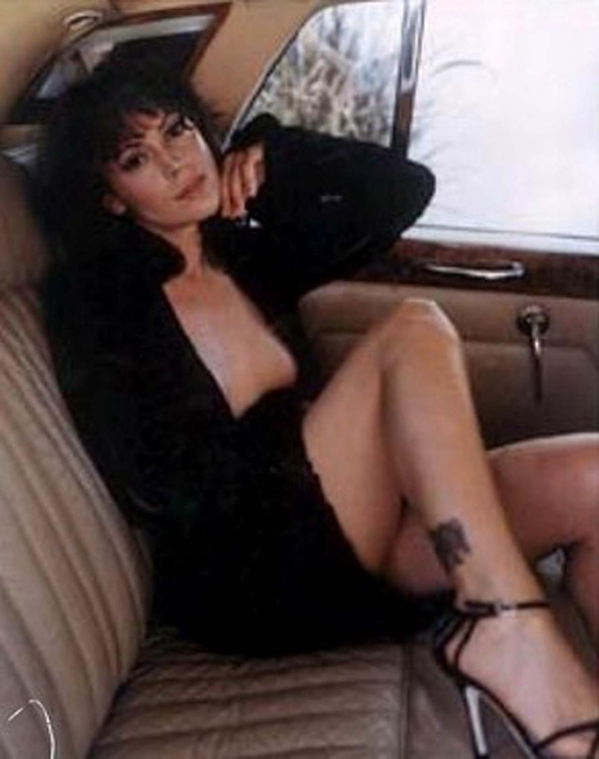10P Alyssa Milano leggy in mini skirt and showing big cleavage and her tits