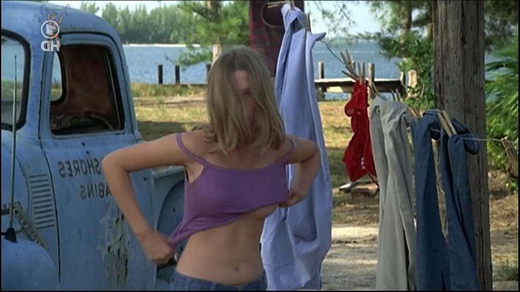 10P Melanie Griffith exposing her nice big tits and hairy pussy in photoshoot