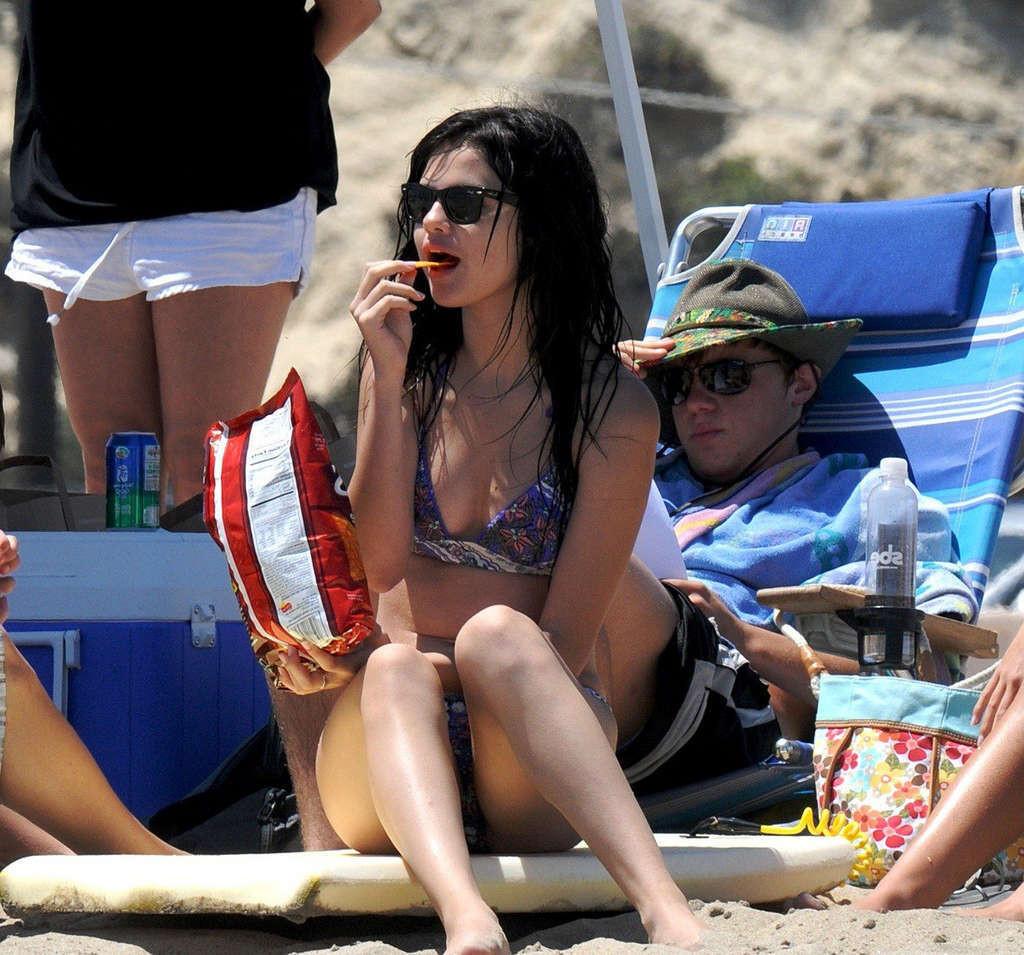 16P Selena Gomez exposing sexy body and hot ass in bikini on beach