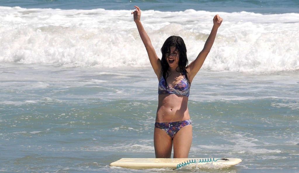 16P Selena Gomez exposing sexy body and hot ass in bikini on beach