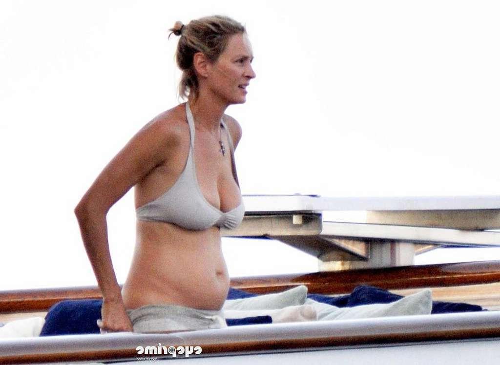 10P Uma Thurman in bikini on yacht paparazzi shoots and showing her big tits