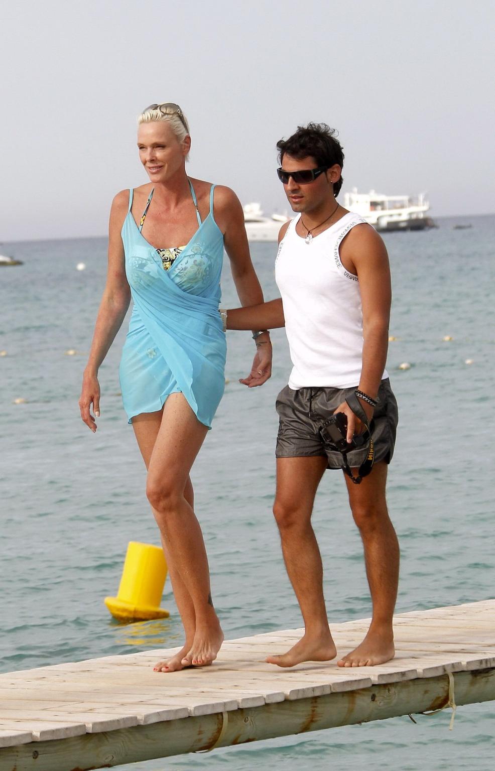 16P Brigitte Nielsen leggy wearing tiny summer dress on a holiday in Saint Tropez