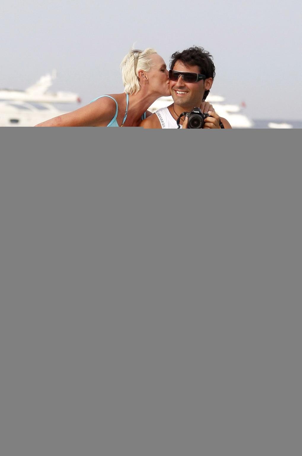 16P Brigitte Nielsen leggy wearing tiny summer dress on a holiday in Saint Tropez