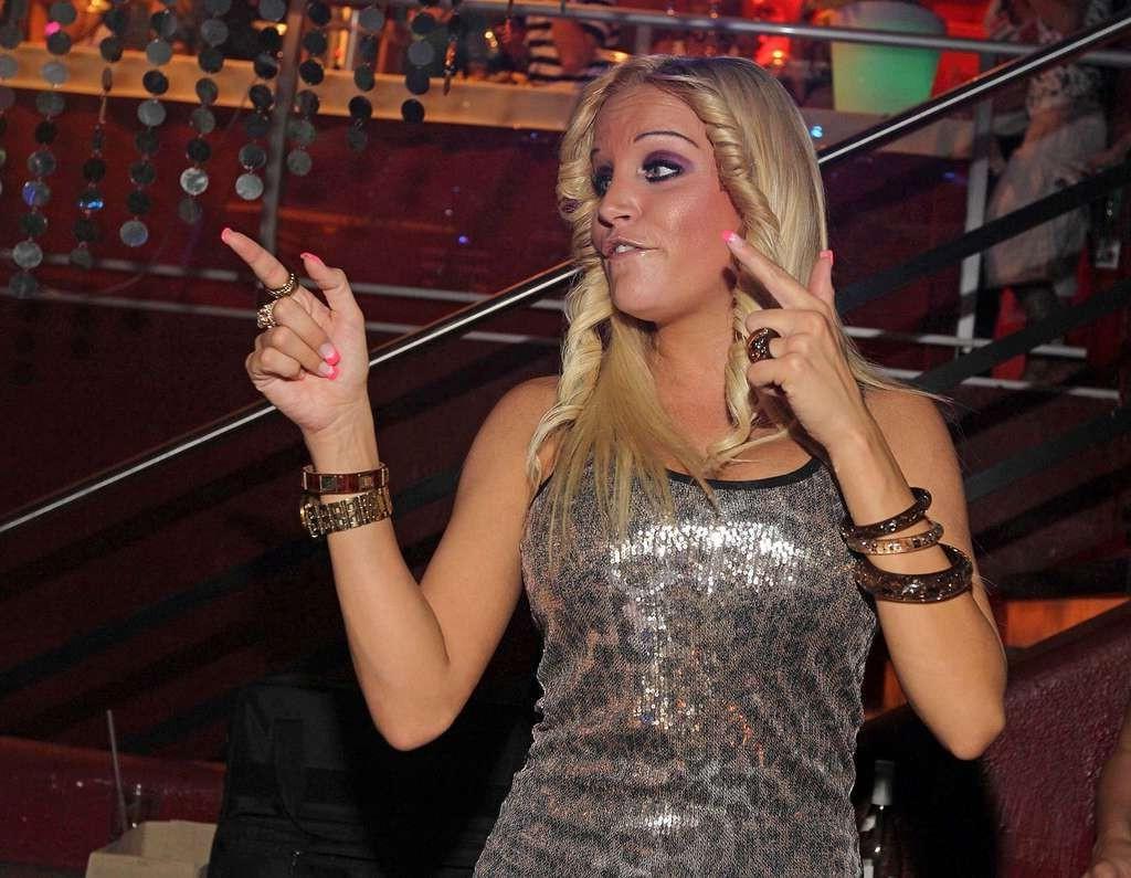 10P Gina Lisa Lohfink leggy in mini skirt and showing her tits and pussy