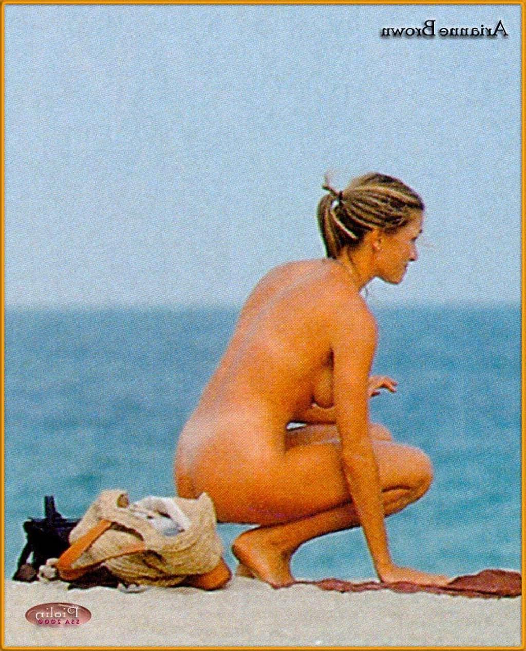 10P Arianne Brown exposing her nice big tits and hairy pussy on beach