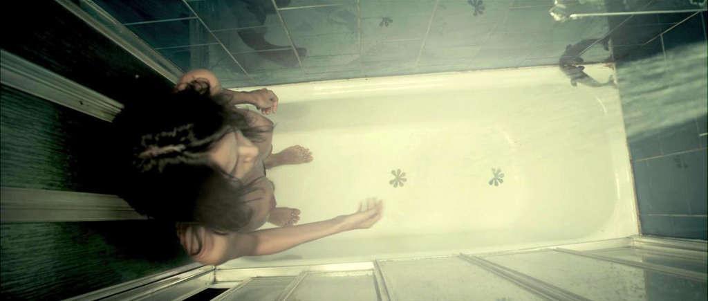 10P Elena Anaya showing her nice big tits and diving topless in water