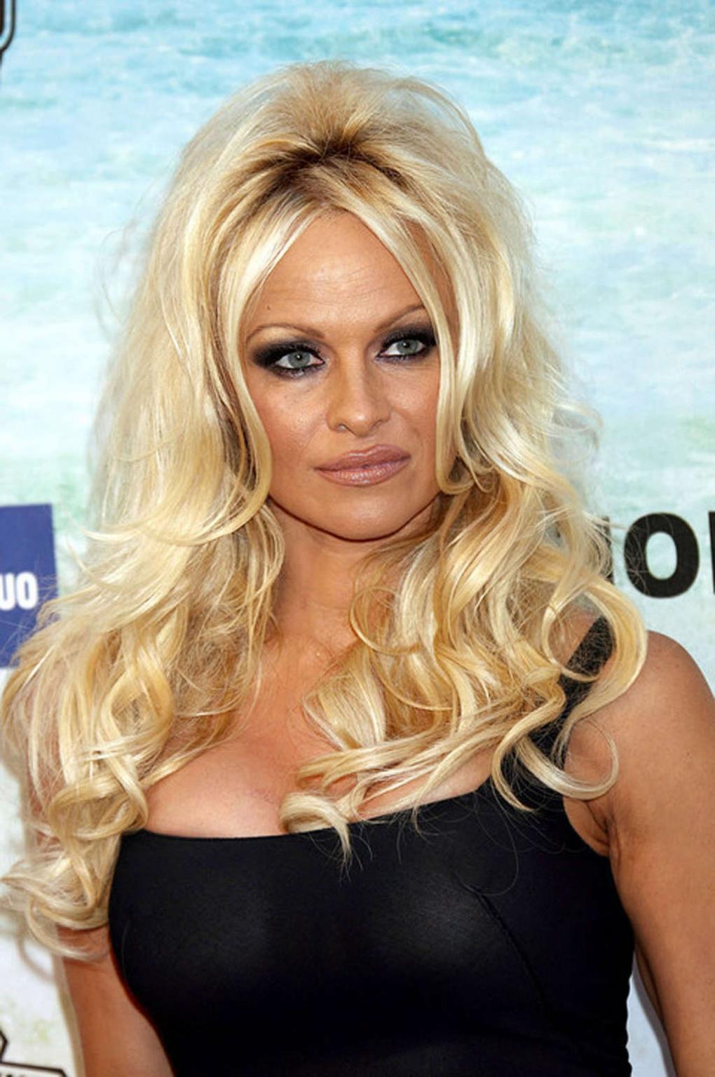 16P Pamela Anderson exposing her sexy body and hot nipples in see thru dress