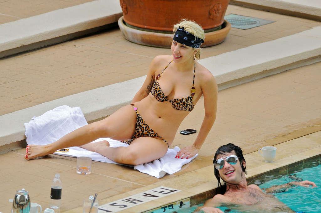 16P Lady Gaga exposing her sexy body and hot ass in bikini on pool