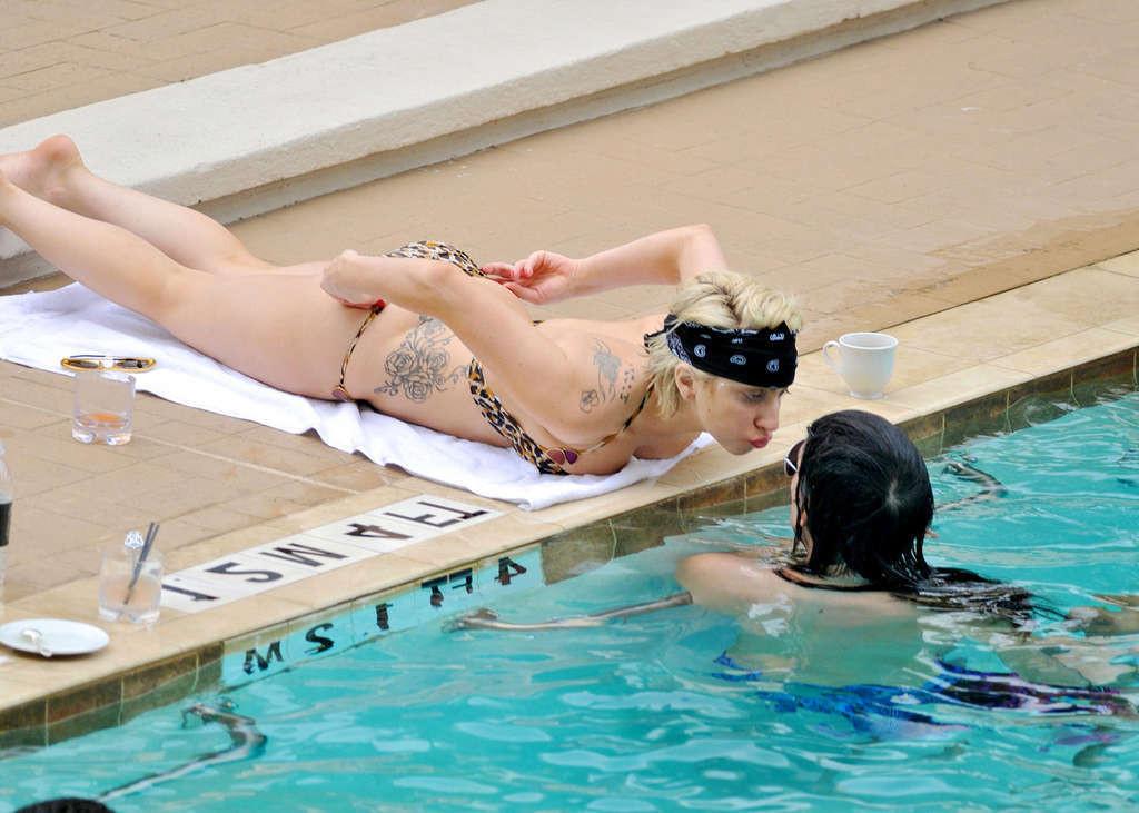 16P Lady Gaga exposing her sexy body and hot ass in bikini on pool