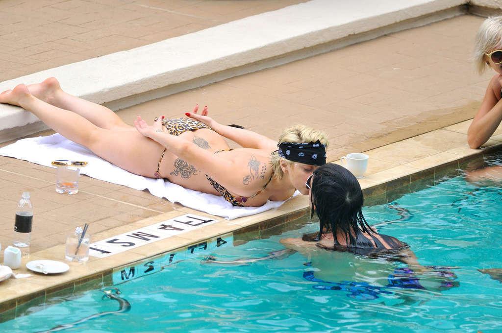 16P Lady Gaga exposing her sexy body and hot ass in bikini on pool
