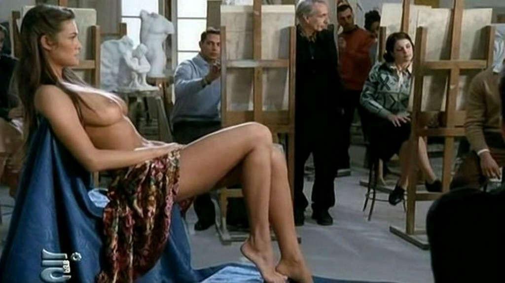 10P Manuela Arcuri exposing her huge boobs in nude movie scenes and posing sexy in b