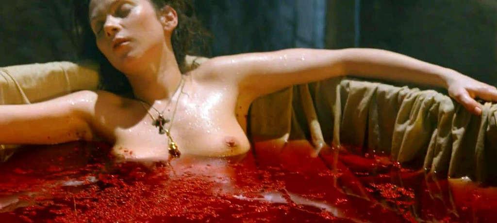 10P Anna Friel exposing her nice tits in nude movie captures and in red leggings