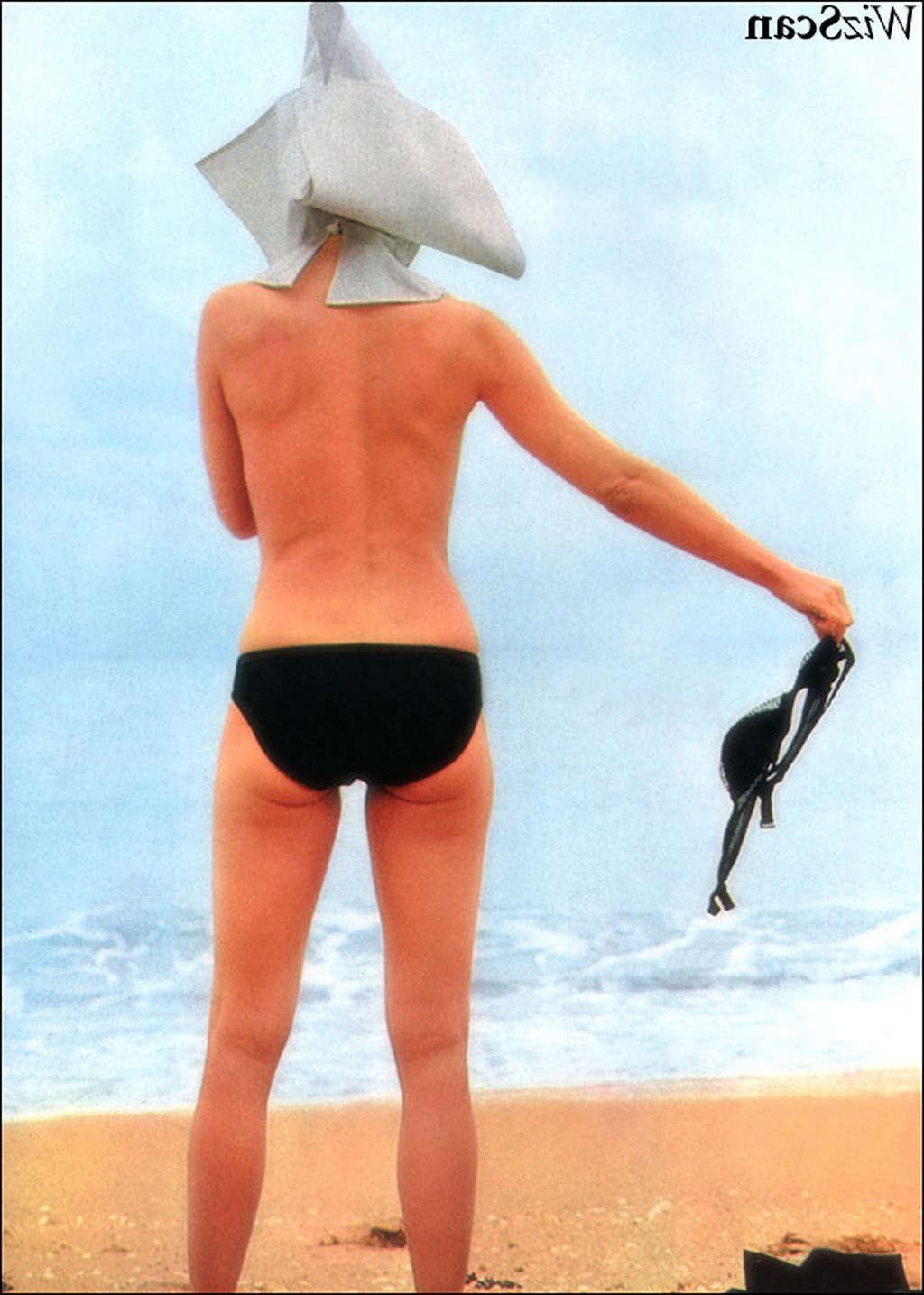 10P Brigitte Bardot exposing her nice big tits and hairy pussy in photoshoot