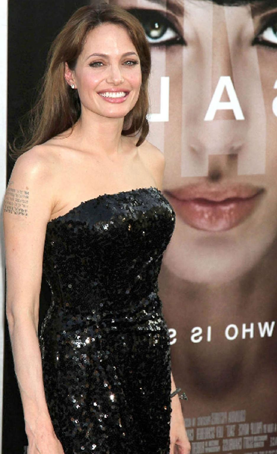 16P Angelina Jolie exposing her sexy body and hot legs in evening dress