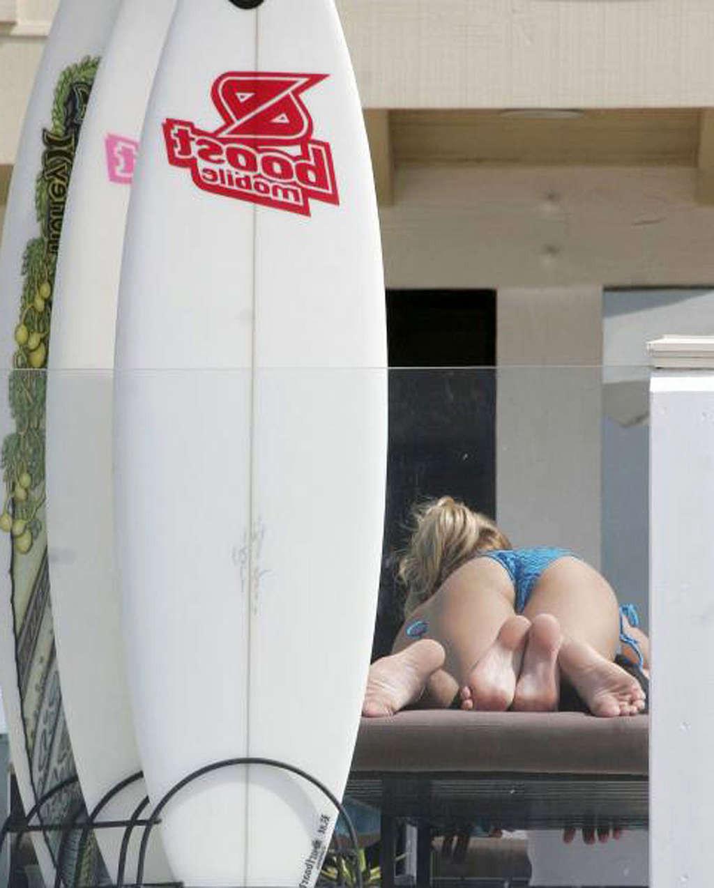 16P Kristin Cavallari exposing her sexy body and hot ass in bikini on pool